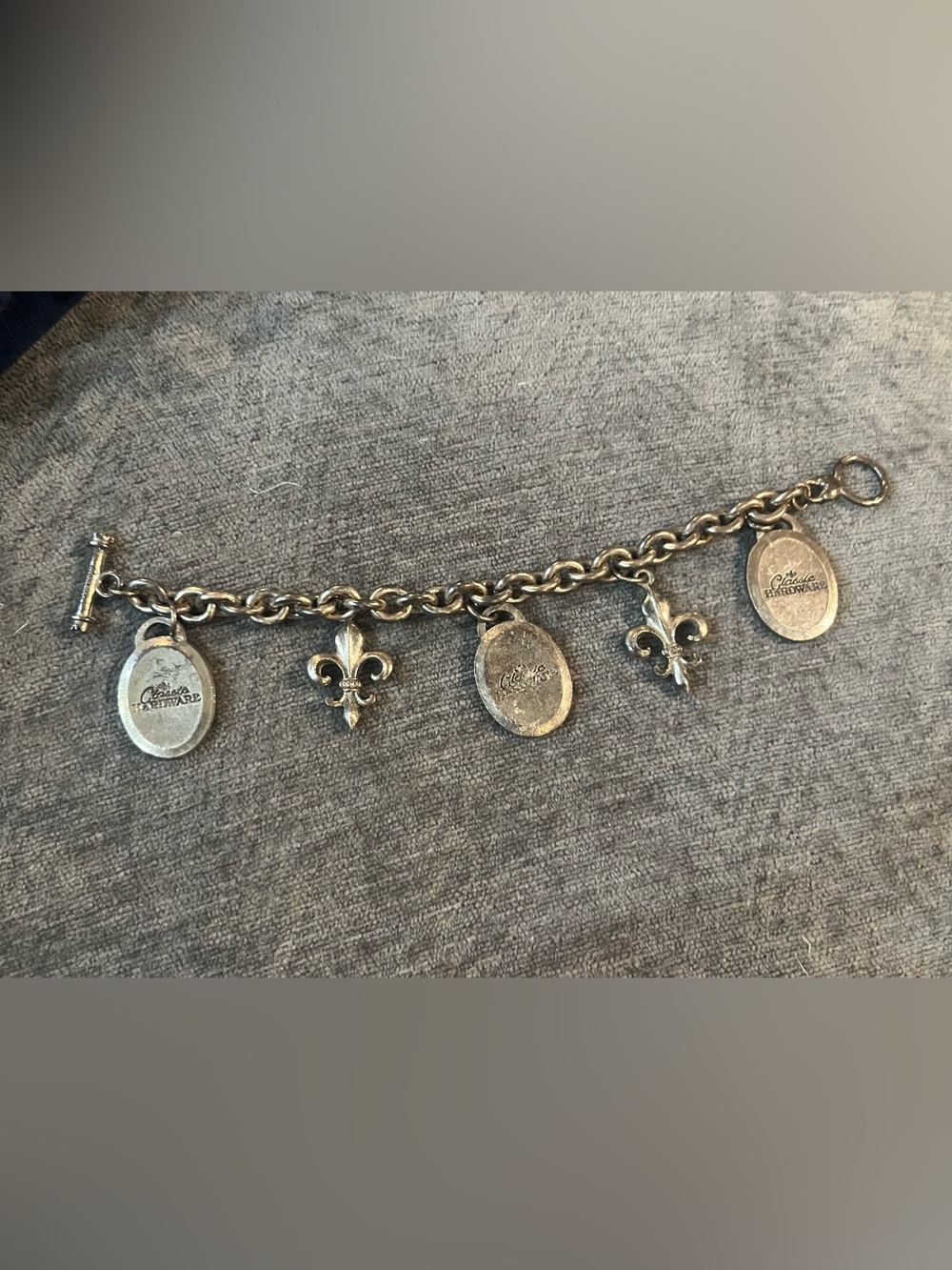 Silver-Tone Classic Hardware Fleur de Lis Charm Bracelet